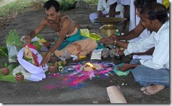 Dressing the altar gods with dhotis