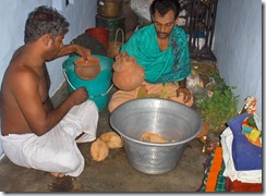 Preparing items for puja at village temple