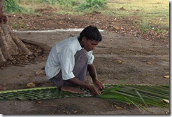 weaving coconut frond