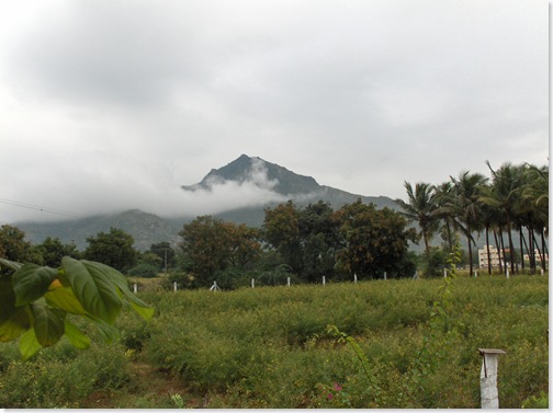 Arunachala behind the  cloud